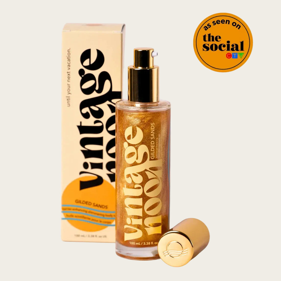 Vintage Noor 'Golded Sands' perfume bottle with gold cap, shown next to its cream-colored packaging box and a separate gold cap on a white background, featuring an 'as seen on the social' badge.