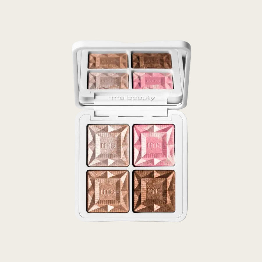 Makeup palette with pink and brown shades on a white background