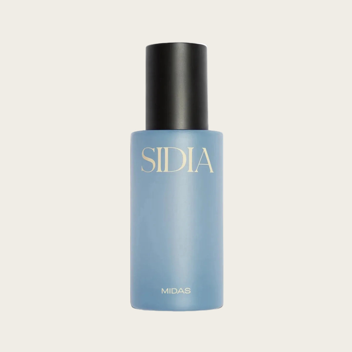 A light blue cosmetic bottle with a matte black cylindrical cap, featuring the brand name 'SIDIA' in gold lettering on the front, set against a plain white background.
