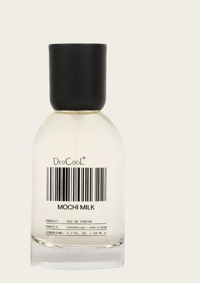 Perfume bottle labeled 'Mochi Milk' by DedCool with a 'Best of Beauty' Allure award badge on a gradient background.