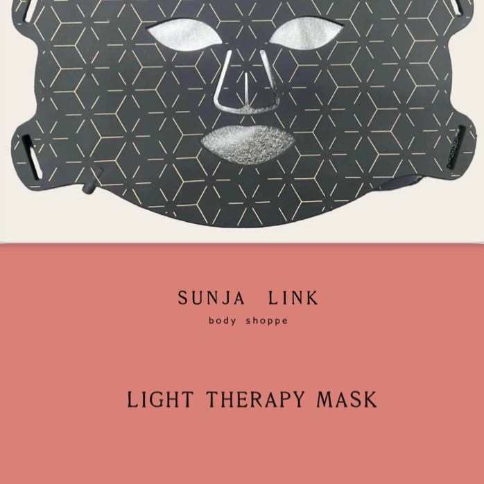 Light therapy mask with geometric design on a pink background, featuring the brand 'Sunja Link'.