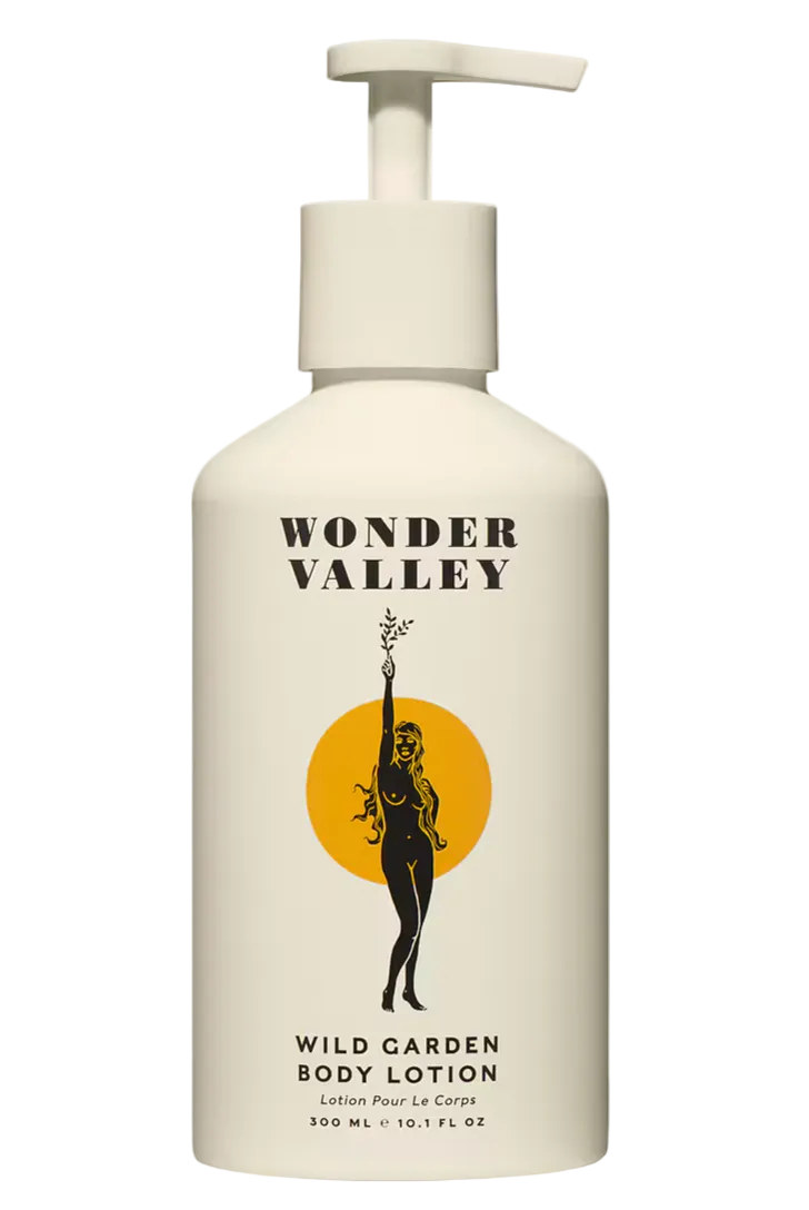 White lotion bottle with 'Wonder Valley' branding on a white background