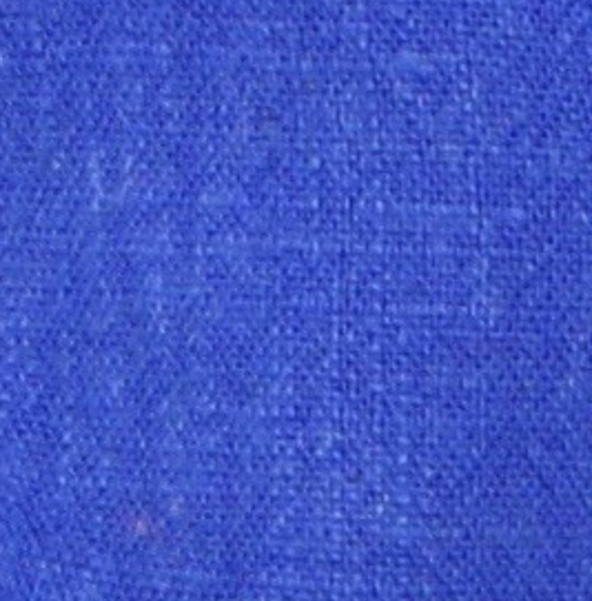 A close-up of a textured blue fabric surface, likely a woven textile or material swatch.