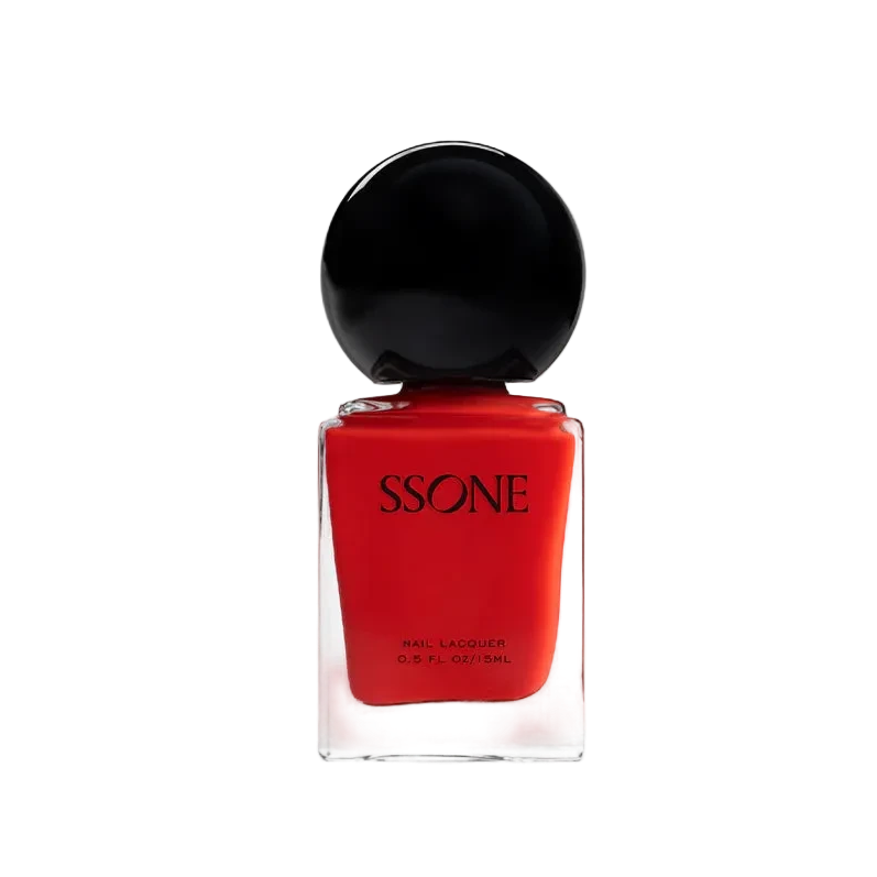 SSONE nail lacquer in a clear glass bottle filled with vibrant red polish, topped with a glossy black spherical cap, set against a seamless white background.