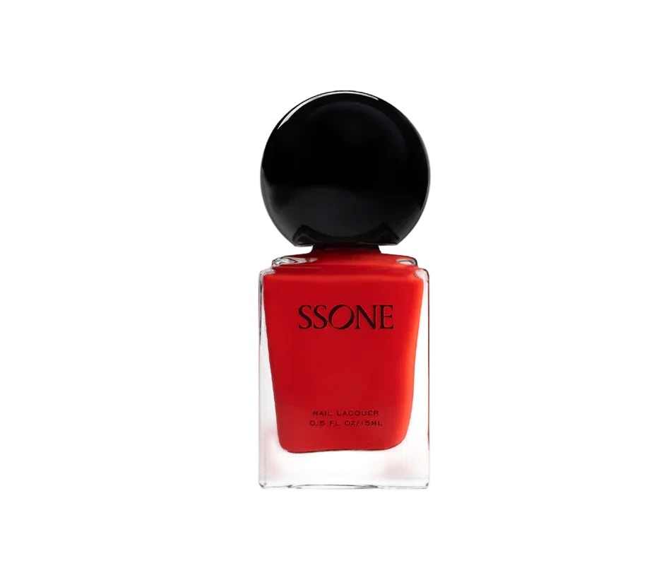 SSONE nail lacquer in a clear glass bottle filled with vibrant red polish, topped with a glossy black spherical cap, set against a seamless white background.