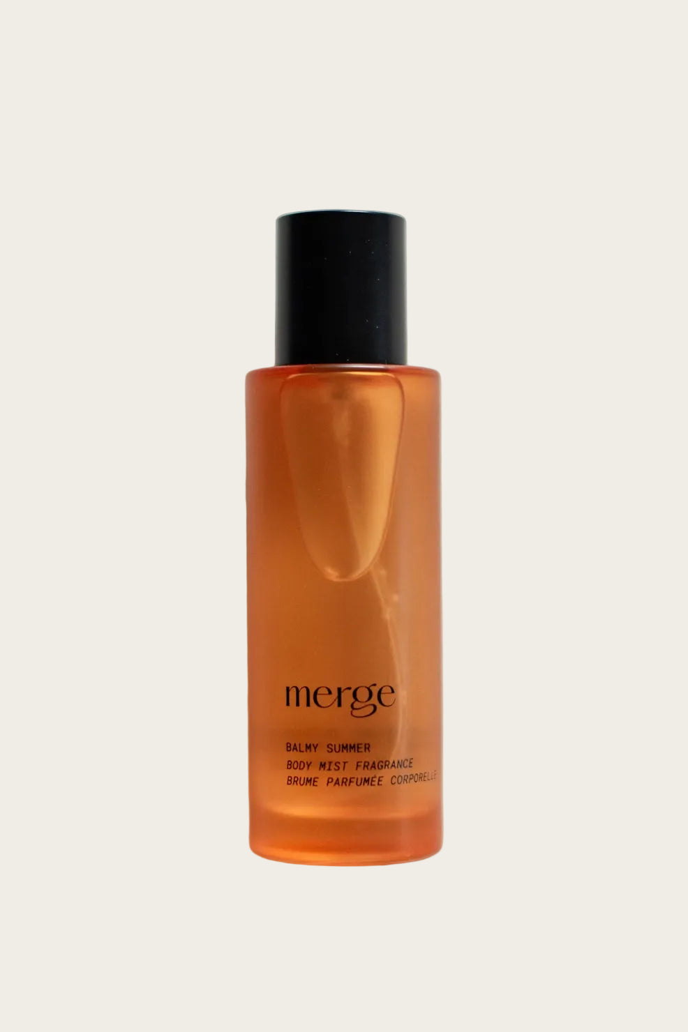 Orange bottle with black cap labeled 'merge' on a light gray background