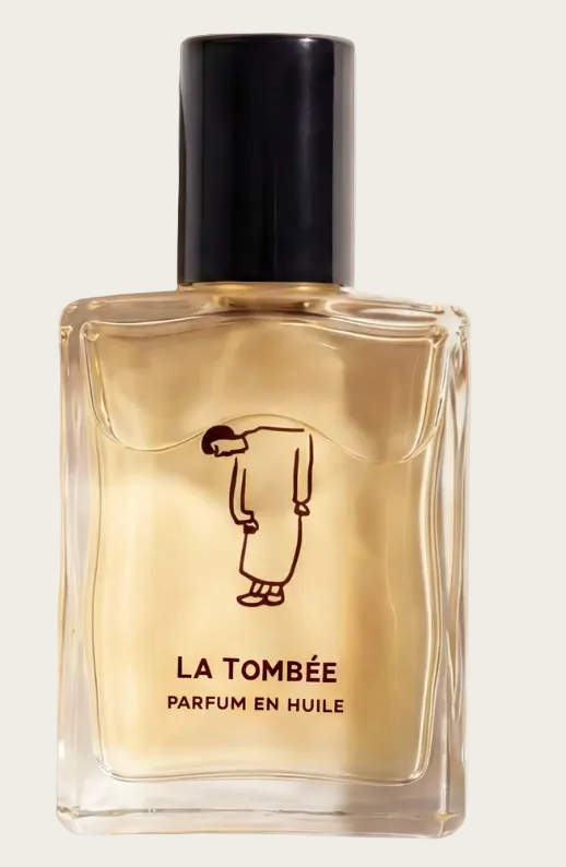Perfume bottle labeled 'La Tombée' with a black cap on a white background
