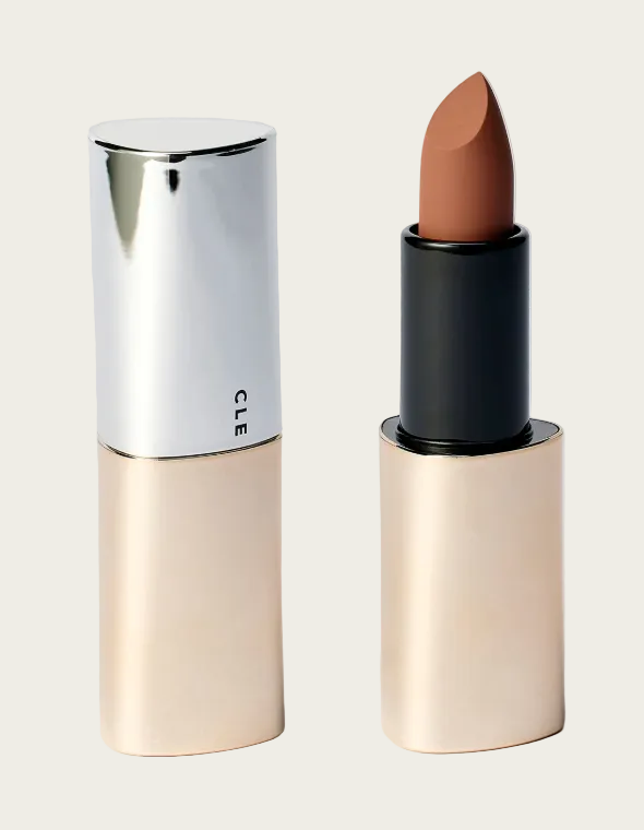 Lipstick with beige casing and brown shade on a light gray background