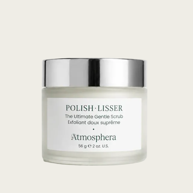 Atmosphere Polish-Lisser exfoliating scrub in a frosted glass jar with a reflective silver lid and a white label, set against a clean white background.