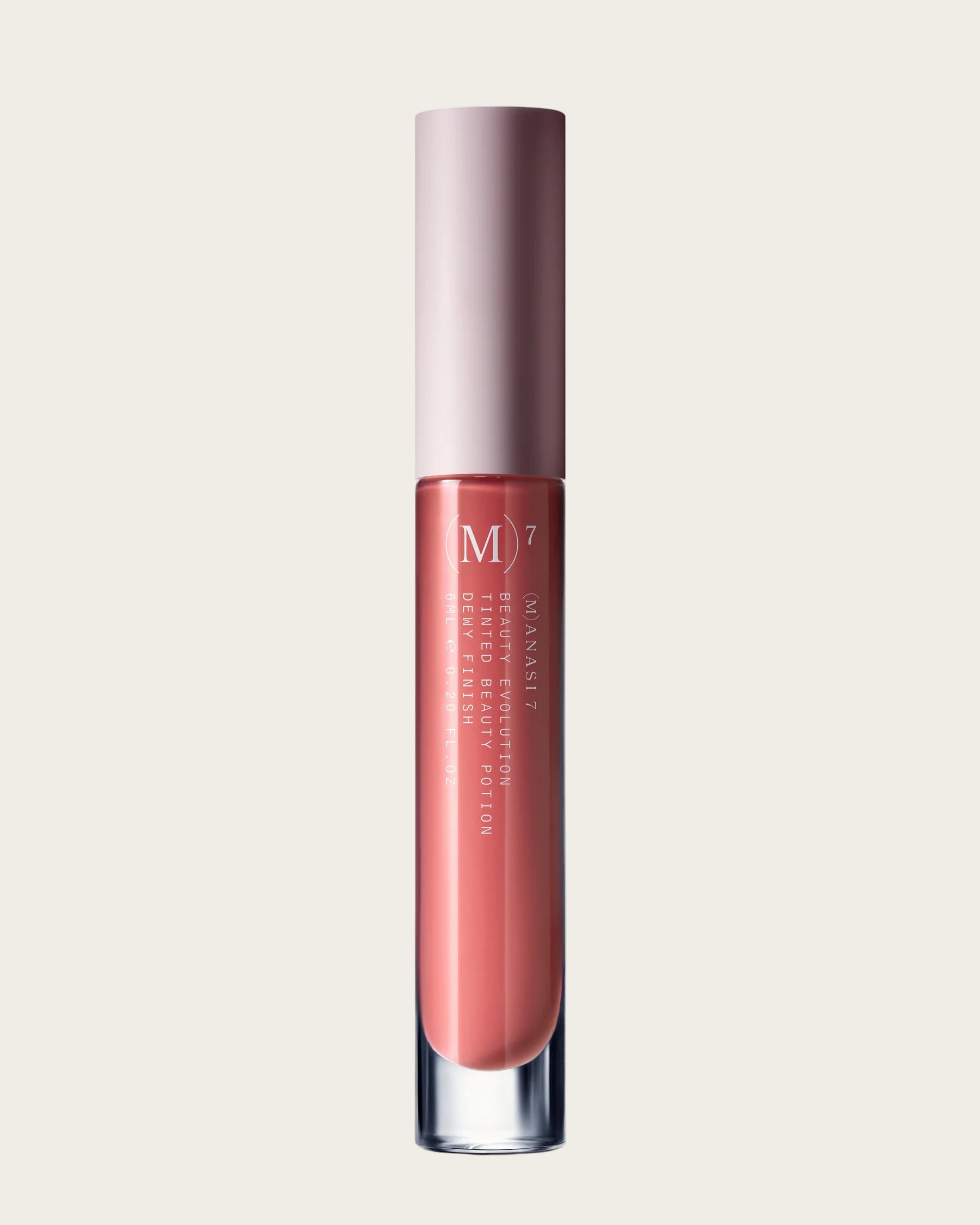 Lip gloss with a pinkish-brown color on a white background